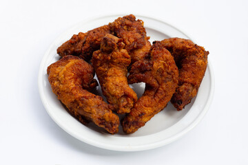 Fried chicken necks on white background.