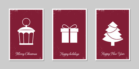 Set of Christmas cards with hanging ball decoration, lantern, tree, gift. A set of vintage frayed postcards. Flat design, vector illustration.