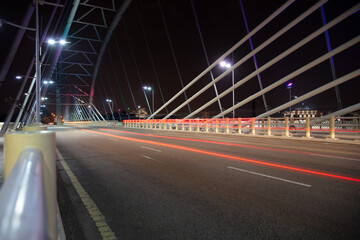 Fototapeta na wymiar wide night asphalt road on the bridge background. High quality photo