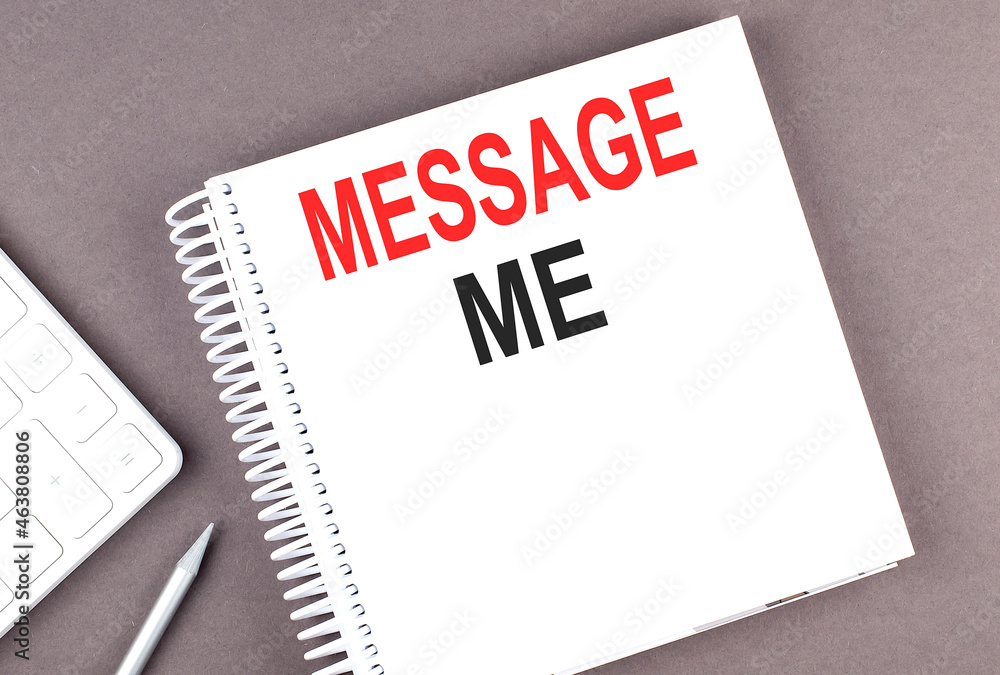 Poster message me text on the notebook with calculator and pen