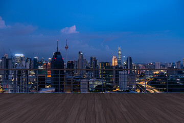 Panoramic Kuala Lumpur skyline view, wooden observatory deck on rooftop, night. Asian corporate and residential lifestyle. Financial city downtown, real estate. Product display mockup empty roof