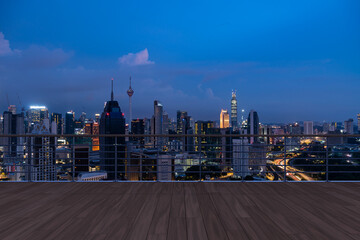 Panoramic Kuala Lumpur skyline view, wooden observatory deck on rooftop, night. Asian corporate and residential lifestyle. Financial city downtown, real estate. Product display mockup empty roof