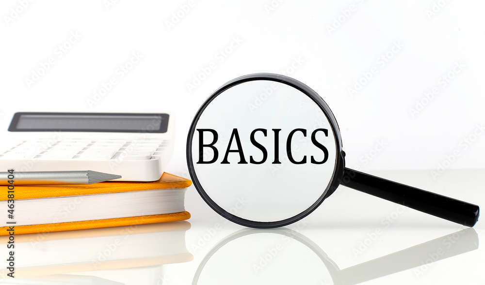 Poster magnifier with text basics with notebook, calculator on the white background