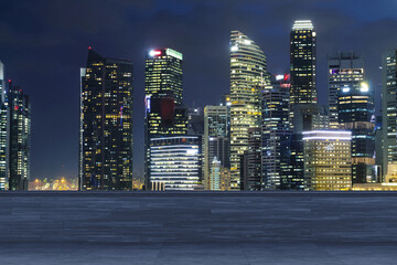 Panoramic Singapore skyline view, concrete observatory deck on rooftop, night time. Asian corporate...