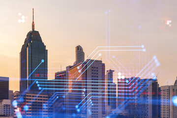 Glowing hologram of technological process, aerial panoramic cityscape of Kuala Lumpur at sunset. KL...
