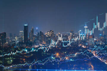 Naklejka na ściany i meble FOREX graph hologram, aerial night panoramic cityscape of Bangkok, the developed location for stock market researchers in Southeast Asia. The concept of fundamental analysis. Double exposure.