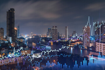 Fototapeta premium FOREX graph hologram, aerial night panoramic cityscape of Bangkok, the developed location for stock market researchers in Southeast Asia. The concept of fundamental analysis. Double exposure.