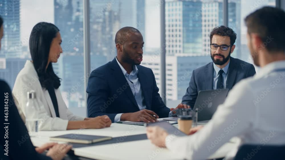 Wall mural Modern Multi-Ethnic Office Conference Room Meeting: Ambitious Motivated Black Businessman Presenting Investment Strategy to Partners, Pitching Investment Strategy. Diverse Team Businesspeople Talk