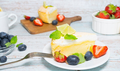 Piece of pie garnished with fresh berries