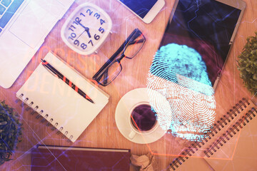 Double exposure of finger print over table with phone. Top view. Concept of mobile security.