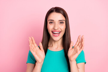 Photo of young woman happy positive smile amazed surprised reaction isolated over pink color background