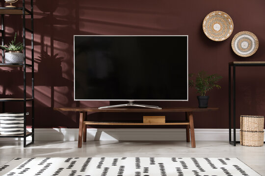 Living room interior with modern TV on stand