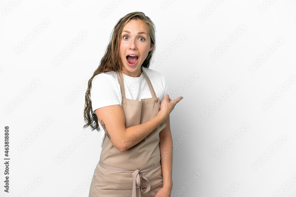 Canvas Prints restaurant waiter caucasian woman isolated on white background surprised and pointing side