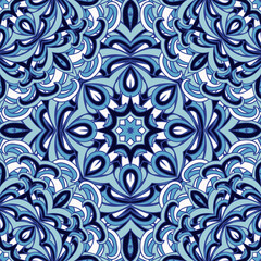 Vector seamless background with flowers. Round pattern. Endless colorful texture with doodle elements. Use for wallpaper, textile, book cover, clothes. In blue and white colors
