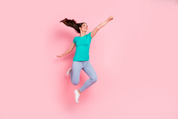Fototapeta na wymiar Full body profile side photo of young woman happy positive smile fly air jump superhero power isolated over pastel color background