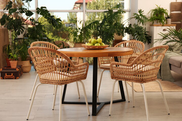 Fototapeta na wymiar Stylish living room with beautiful plants. Interior design