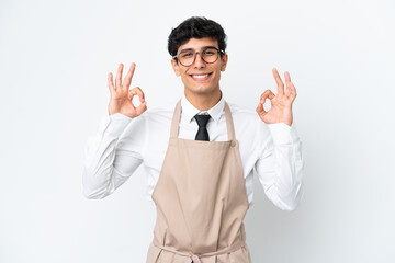Restaurant Argentinian waiter isolated on white background showing an ok sign with fingers