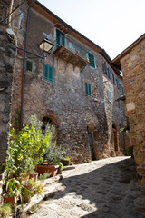 Monticiano (SI), Italy - August 01, 2021: Monticiano houses and village view, Tuscany, Italy