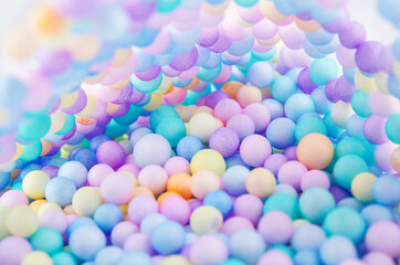 Foam beads of various colors brightly colored.