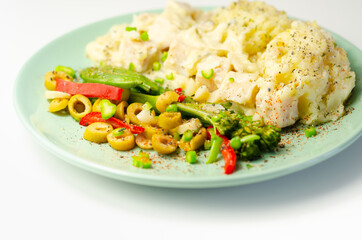 Tender pieces of smoked haddock and pollock in a creamy cheese sauce sat beneath buttery mash served with vegetables