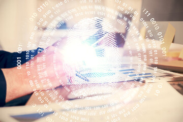 Double exposure of man's hands holding and using a digital device and fingerprint hologram drawing. Security concept.