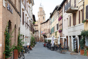 Fototapeta na wymiar Buonconvento (SI), Italy - August 01, 2021: Buonconvento houses and village view, Tuscany, Italy