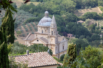 Fototapeta na wymiar Montepulciano (SI), Italy - August 02, 2021: View of Saint Biagio temple from Montepulciano town, Tuscany, Italy