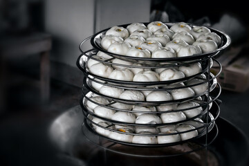 Chinese food steamed buns in a container