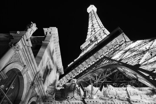 Las Vegas, Nevada, USA - October 6, 2016: View of the Paris Eiffel Tower at night, black and white image. Paris Las Vegas is a luxury resort and casino on Las Vegas Strip. 