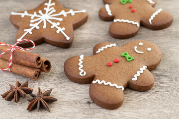 Traditional christmas gingerbread cookies over a wooden table