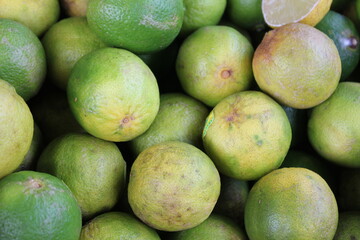 green lemons in the market