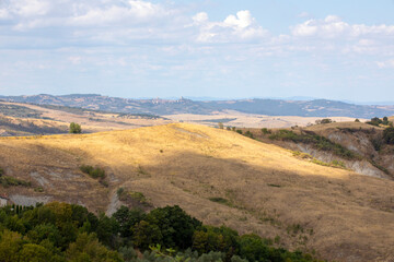 Val d' Orcia (SI), Italy - August 05, 2021: Typical landscape in val d' Orcia, Tuscany, Italy
