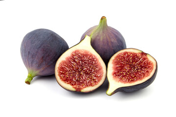 Fig fruit with ripe red halves isolated on white