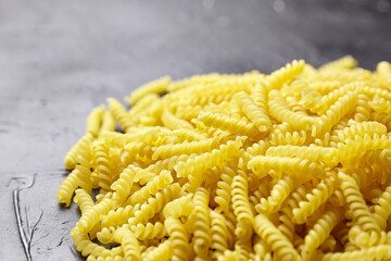 Girandole pasta on black stone table