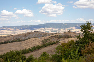 Val d' Orcia (SI), Italy - August 05, 2021: Typical landscape in val d' Orcia, Tuscany, Italy