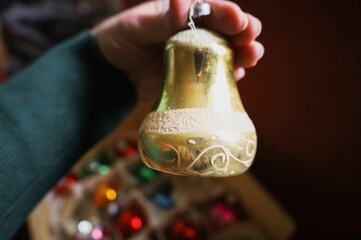 christmas toy in the form of a bell in retro style. preparation for the new year