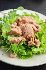 Cod liver salad mix petals lettuce leaves fish fat seafood omega-3 vitamin aperitif fresh meal snack on the table copy space food background keto or paleo diet veggi vegetarian pescetarian diet
