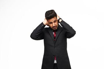 Headache and bad day of an Indian manager in a suit on an isolated white background