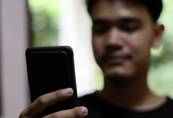 Closeup Group Adult Hipsters Friends Sitting Sofa Using Hands Modern Smartphone Tablet.Business Startup Friendship Teamwork Concept.People Working Together Project.Coworking Process.