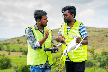 Selective focus on drone, Trainer teaching by explaining about drone operations to student - Concept drone or UAV pilot training.