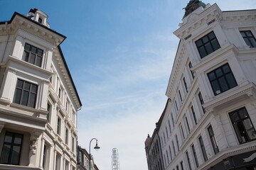 Fragment of Modern residential apartment with flat buildings exterior. Detail of New luxury house and home complex. Part of City Real estate property and condo architecture. Copy space. Blue sky