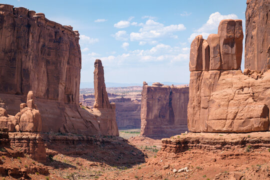 Red sandstone towers and cliff features in Arches National Park, Utah. Landmark known as Park Avenue. © andrewhagen