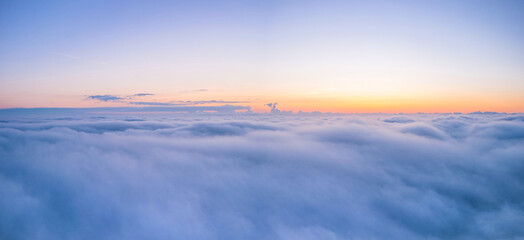 Fototapeta na wymiar Panorama of Dawn over the Fog from a drone, Devon, England, Europe