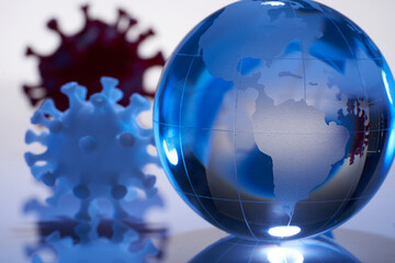 3d printed icon of  coronavirus and glass globe  on white background with reflection