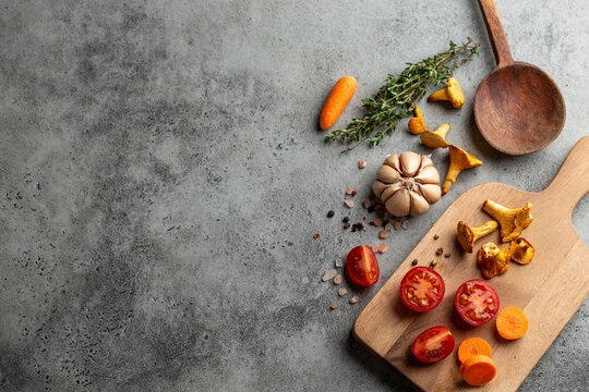Fresh cherry tomatoes, wild forest hanterelles, carrot, garlic and herbs