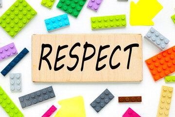 Respect. text on wood block on white background. business concept