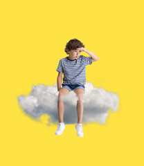 Creative collage with little preschool boy sitting on white cloud and flying at sky. Concept of...