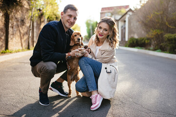 Romantic happy couple in love enjoying their time with pets