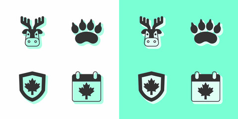 Fototapeta premium Set Canada day with maple leaf, Deer head antlers, flag on shield and Bear paw footprint icon. Vector