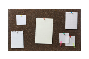 Empty notes pinned to cork board on white background